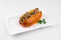 Isolated beef hot dog with mustard on the white