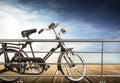 Isolated bicycle in wooden sidewalk Royalty Free Stock Photo