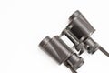 Military isolated black binoculars white background, top view