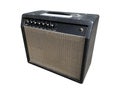 Isolated black leather vintage electric guitar British style amplifier with a black knob on white background with clipping path. Royalty Free Stock Photo