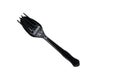 Isolated black plastic spoon and fork on white background, takeaway utensil spoon and fork, top view image Royalty Free Stock Photo