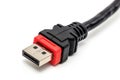 Isolated black and red computer cable on a clean white background Royalty Free Stock Photo