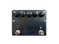 Isolated black wood texture distortion and cabinet simulator dual- channel stompbox electric guitar effect for studio and stage