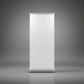 Isolated blank roll up banner stand mockup on a gray background for advertising presentation display Royalty Free Stock Photo