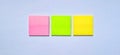 blank sticky notes on the gray white background. Royalty Free Stock Photo