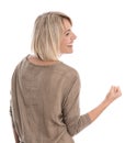 Isolated blond middle aged woman making fist: concept for success and courage. Royalty Free Stock Photo