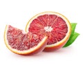 Isolated blood oranges. Half of red orange fruit and a piece with leaves isolated on white background with clipping path. Royalty Free Stock Photo