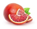 Isolated blood oranges. Whole red orange fruit and a pieces with leaves isolated on white background with clipping path. Royalty Free Stock Photo