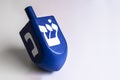 Isolated blue dreidel in a white background Royalty Free Stock Photo