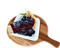 Isolated blueberry cheese cake on a wooden plate with white background. Royalty Free Stock Photo