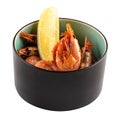 Isolated bowl of grilled beer shrimp with lemon