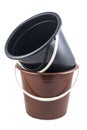 Isolated braun and black plastic buckets