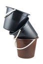 Isolated braun and black plastic buckets
