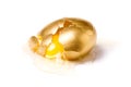 Isolated broken golden egg Royalty Free Stock Photo