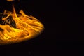 Isolated burning flame or fire on black background. Royalty Free Stock Photo