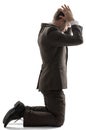 Isolated business man pray position Royalty Free Stock Photo