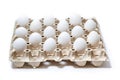 Isolated carton box with distanced white eggs. concept of quarantine rules Royalty Free Stock Photo