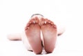 Isolated caucasian feet in white background