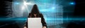 Isolated caucasian woman typing on laptop, wearing black sweet, with digital blue blackboard