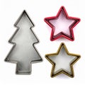 Isolated Christmas Tree and Star Cookie Cutters on White Background Royalty Free Stock Photo