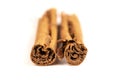 Isolated cinnamon sticks on the white background Royalty Free Stock Photo