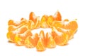 Isolated citrus segments. Collection of tangerine, orange and other citrus fruits peeled segments isolated on white background wit Royalty Free Stock Photo