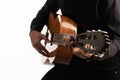 Isolated classical guitar and guitarist`s hands up close on a white background Royalty Free Stock Photo