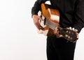 Isolated classical guitar and guitarist`s hands up close on a white background Royalty Free Stock Photo