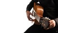 Isolated classical guitar and guitarist`s hands up close on a white background Royalty Free Stock Photo