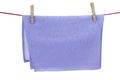 Isolated Clean Dry Violet Towel Hanging On A Red Rope