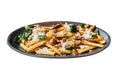 Isolated close-up French fries with fried basil, Thai chili and feta cheese with fork. Thai fusion food Royalty Free Stock Photo