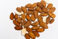 Isolated Close up, macrophotography, of dry roasted Almond nuts on white background.