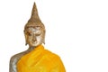 Isolated closeup golden Buddha statue coated by the golden leaf at the buddhism temple on the white background Royalty Free Stock Photo