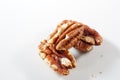 Isolated closeup of pecans on white background