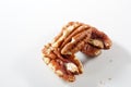 Isolated closeup of pecans on white background Royalty Free Stock Photo