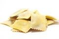 Isolated closeup shot of pumpkin-filled egg pasta in front of a white background