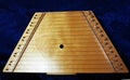 Isolated closeup of 15 String Wooden Auto Harp Lap Harp Lute Zither