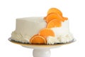 isolated closeup vanilla cake with orange slices Royalty Free Stock Photo
