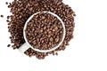 Isolated Coffee Beans Overflowing from a Cup Royalty Free Stock Photo