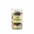 Isolated coins in jar with life insurance label