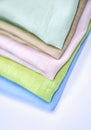 Isolated colorful towels or multicolor linen cloth in stack Royalty Free Stock Photo