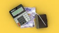isolated composition of Taiwan dollar notes, a calculator, a note book and a pen Royalty Free Stock Photo