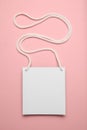 Isolated convention name badge on pink background, plastic tag id card mockup Royalty Free Stock Photo