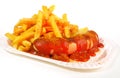 Isolated Curry Wurst with French Fries