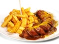 Isolated Curry Sausage with French Fries