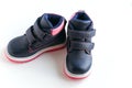dark blue with pink children s spring and autumn leather shoes on a white background