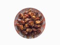Isolated dates in bowl with syrup. Iftar dates Royalty Free Stock Photo