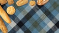 Isolated different kinds of bread on a tablecloth background. Photo of variety of bread with copy space. Top view. Related to Royalty Free Stock Photo