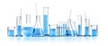 Isolated different laboratory glassware with blue liquids