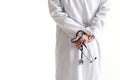 Isolated doctor holding stethoscope behind his back